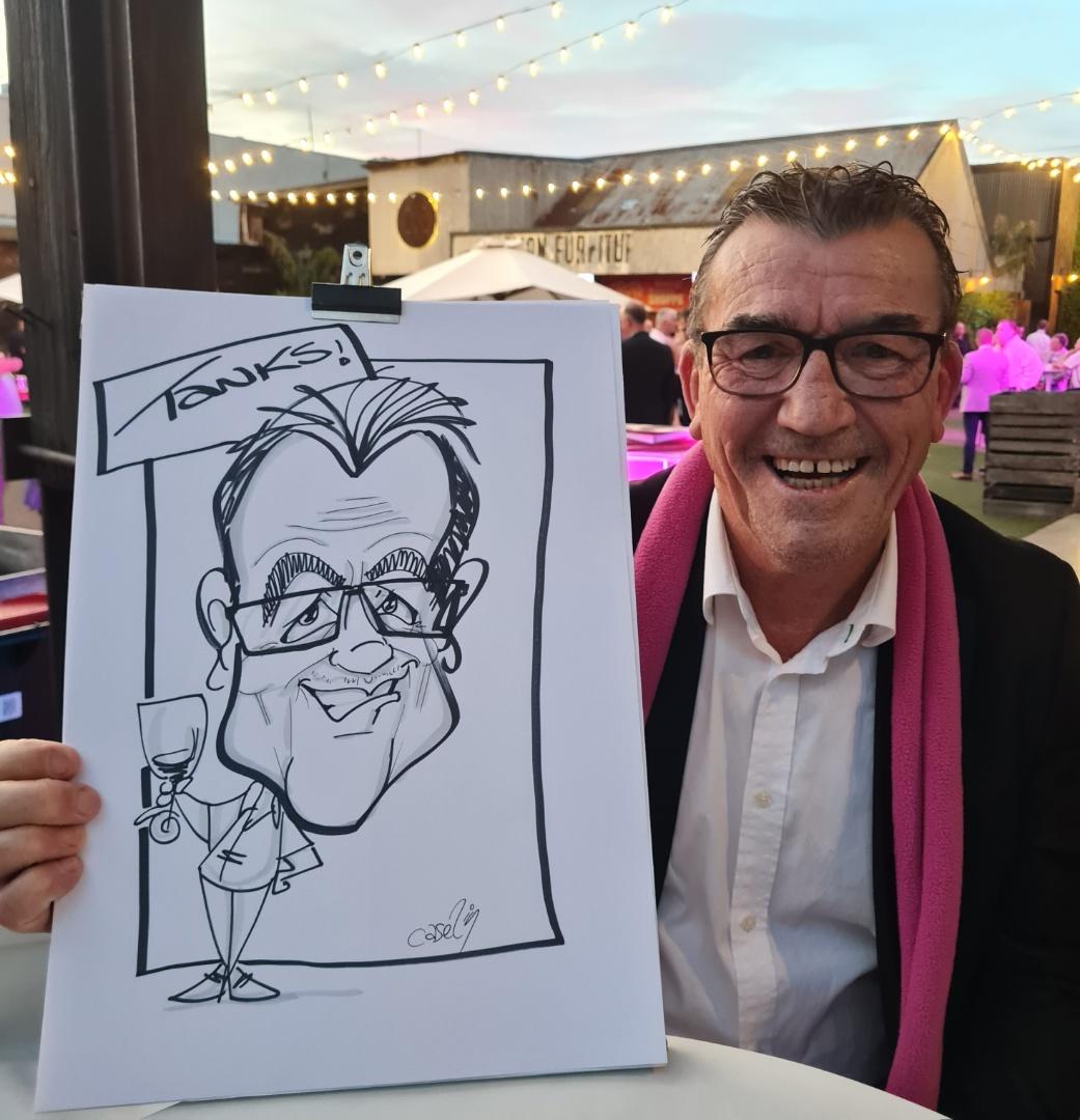 Caricature by Peter Caselin